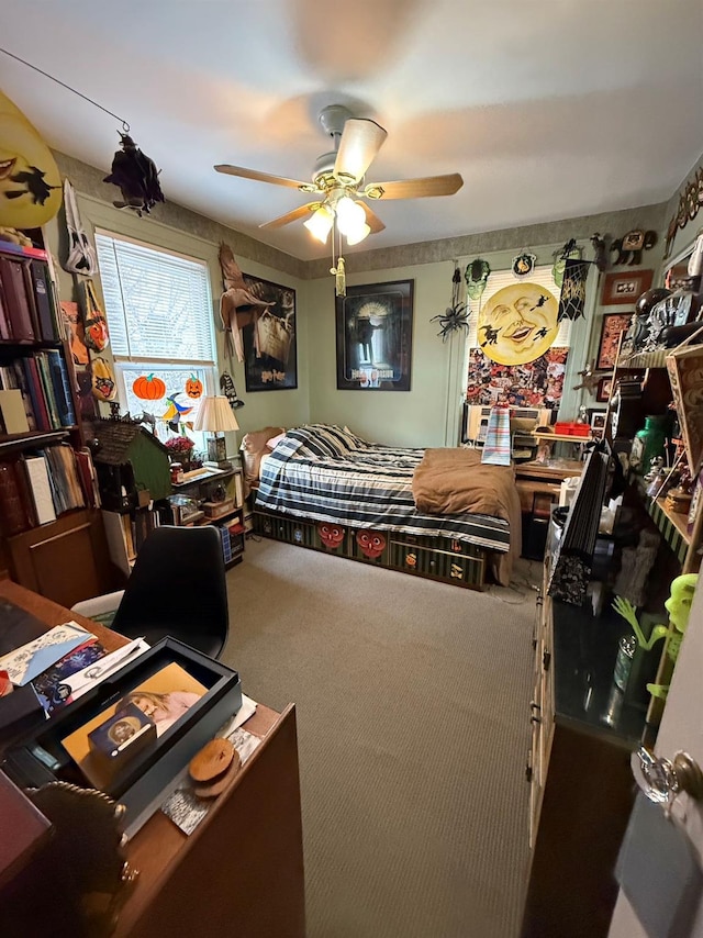 bedroom featuring carpet floors and ceiling fan