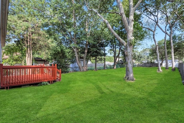 view of yard with a deck