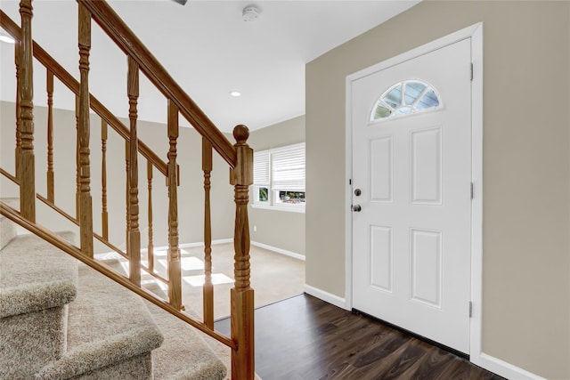 entrance foyer featuring dark wood-type flooring