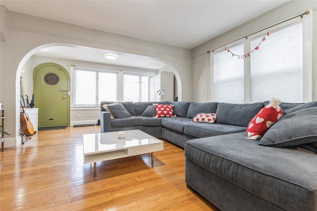 living room with light hardwood / wood-style flooring