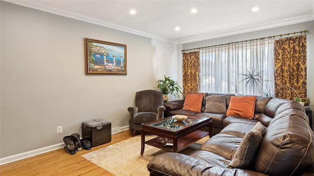 living room featuring ornamental molding and wood-type flooring