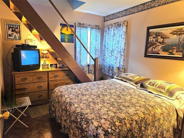 bedroom with parquet floors