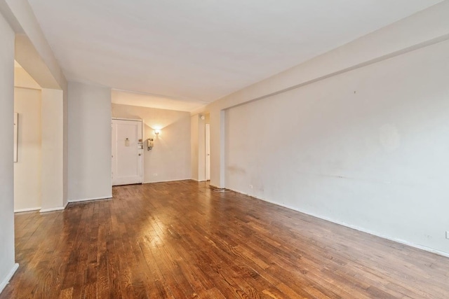 spare room with hardwood / wood-style flooring