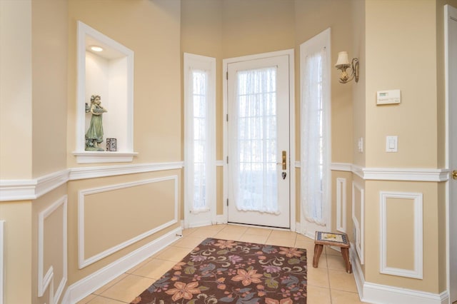 doorway featuring light tile patterned floors