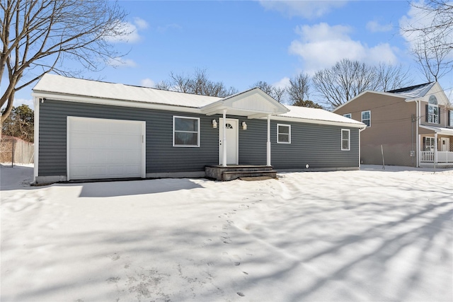 ranch-style house featuring a garage