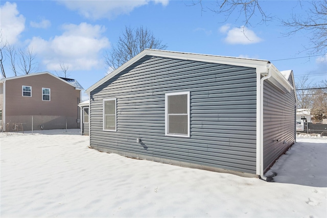 view of snow covered property