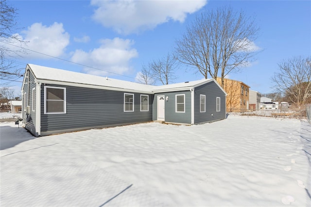 view of snow covered house