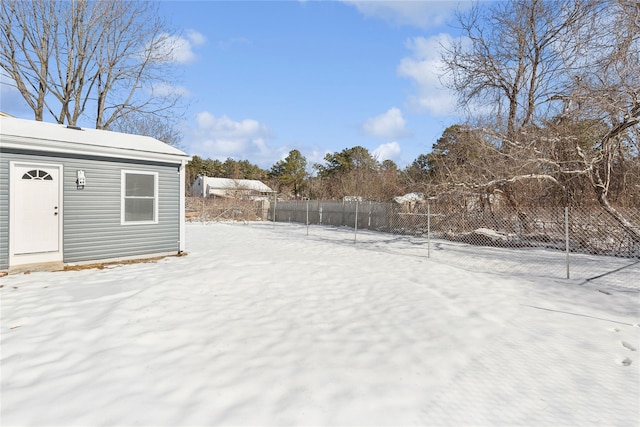 view of yard covered in snow