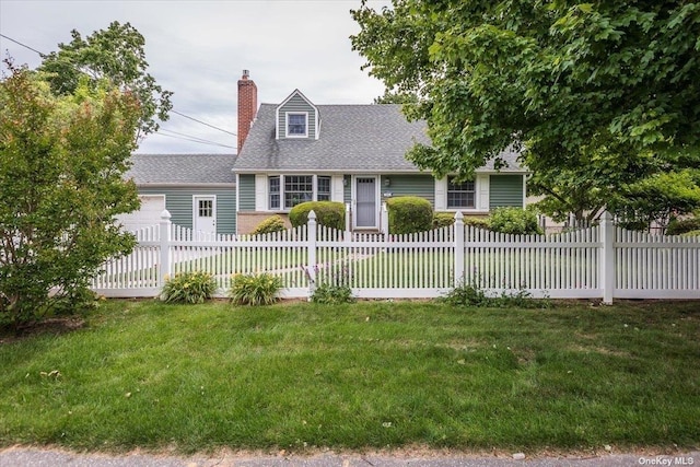 cape cod home with a garage and a front yard