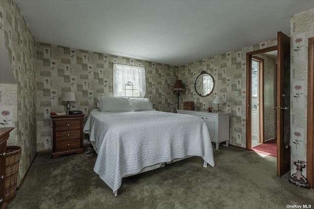 bedroom with dark carpet