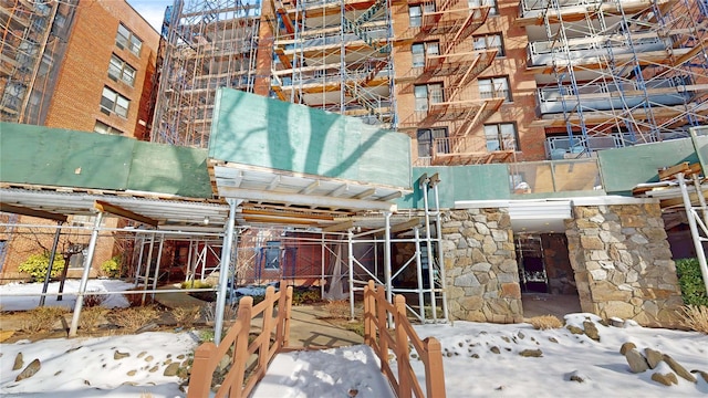 view of snow covered property