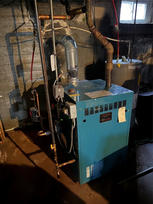 253 William St, West Hempstead, NY 11552 - utility room with water heater