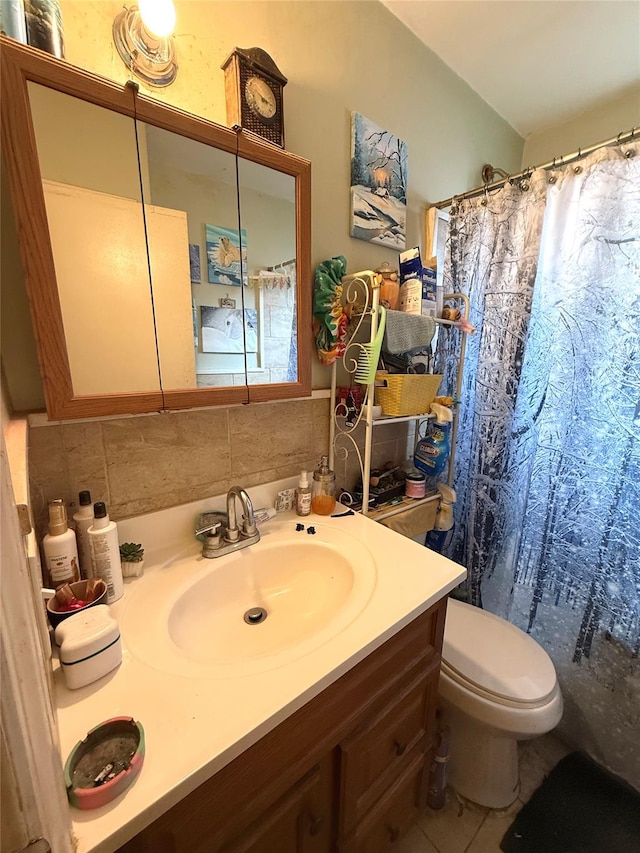 253 William St, West Hempstead, NY 11552 - bathroom with tasteful backsplash, a shower with shower curtain, toilet, and vanity
