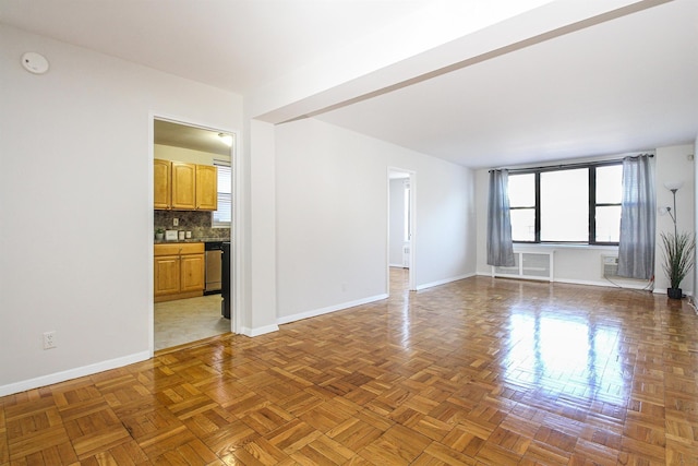 empty room with light parquet flooring