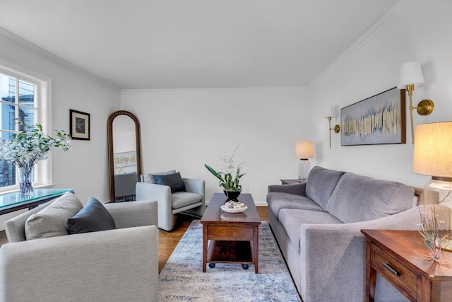 living room with crown molding and light hardwood / wood-style flooring