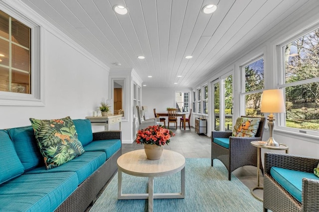 sunroom featuring wood ceiling