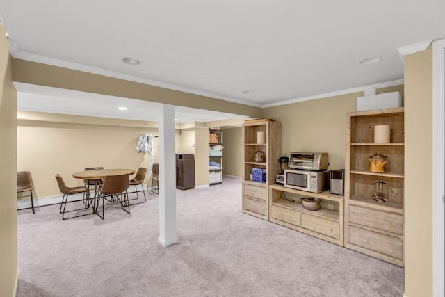 rec room featuring crown molding and light colored carpet