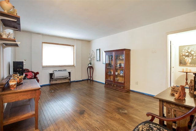 living area featuring dark hardwood / wood-style floors