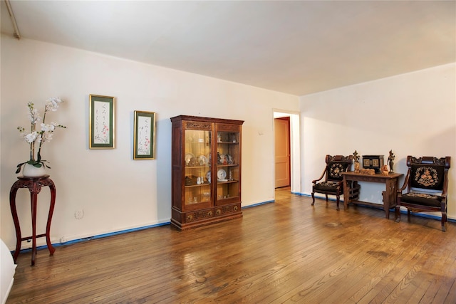 living area featuring hardwood / wood-style floors