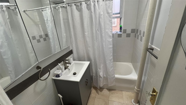 bathroom featuring vanity and shower / bath combo with shower curtain