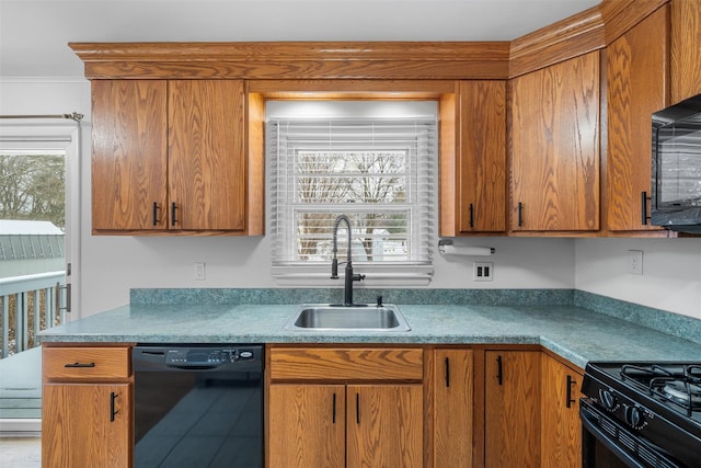 kitchen featuring sink, ornamental molding, and black appliances