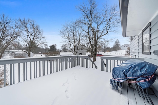 view of snow covered deck