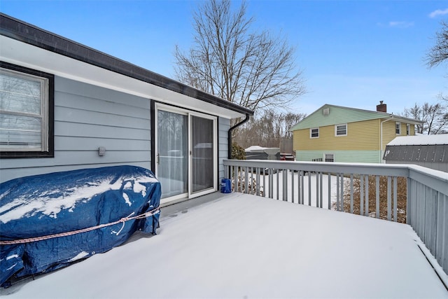 view of snow covered deck