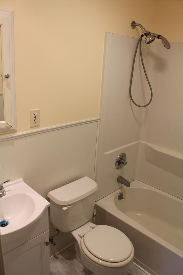 full bathroom featuring vanity, shower / bathtub combination, and toilet