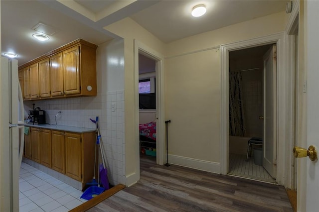 interior space featuring light hardwood / wood-style floors and white fridge