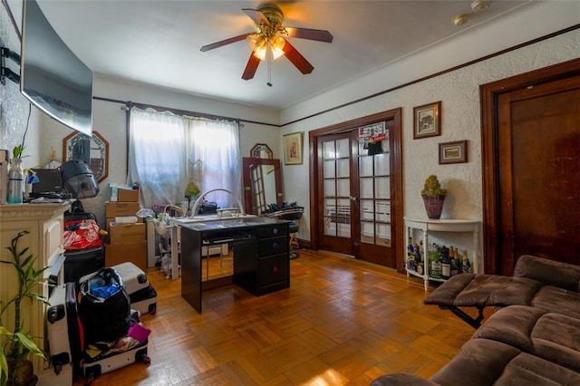 home office with parquet flooring and ceiling fan