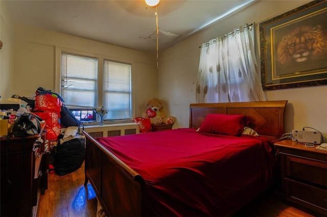 bedroom featuring dark hardwood / wood-style floors