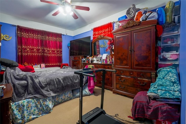 carpeted bedroom featuring ceiling fan