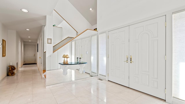 entrance foyer featuring light tile patterned floors