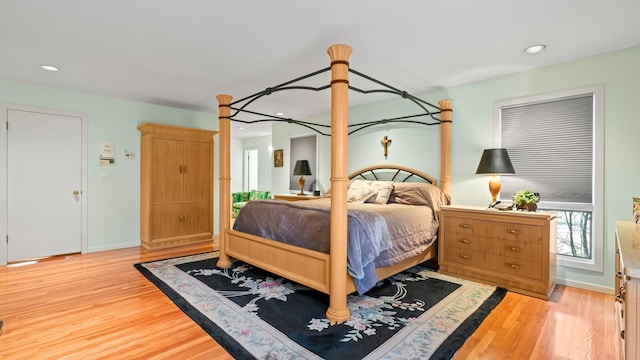 bedroom with light wood-type flooring