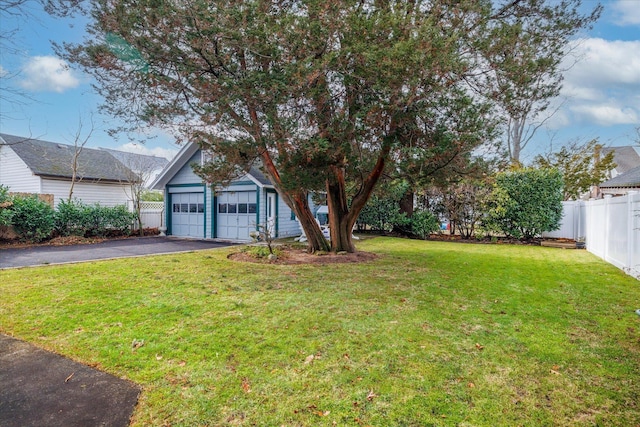 view of yard featuring a garage