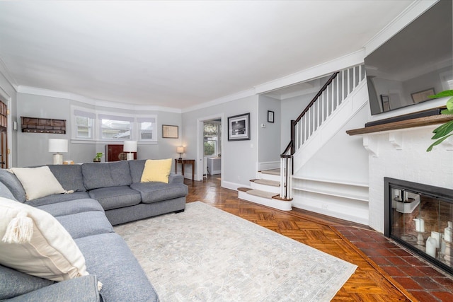 living room with ornamental molding and dark parquet floors