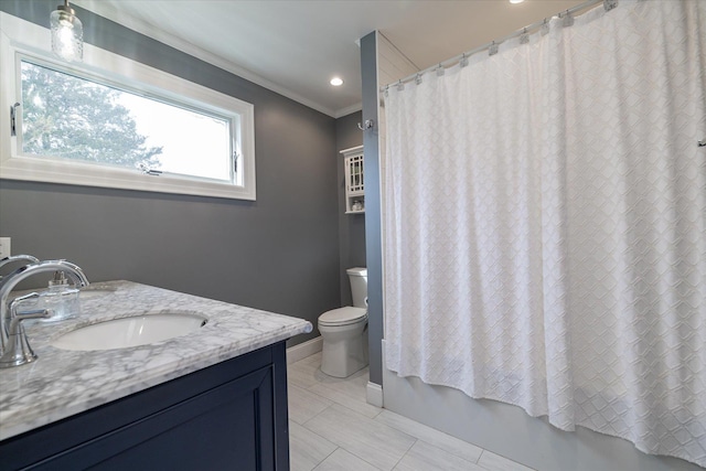 full bathroom with shower / bath combination with curtain, ornamental molding, toilet, and vanity