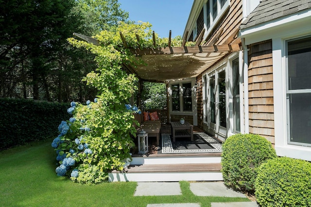 exterior space with a grill and a pergola