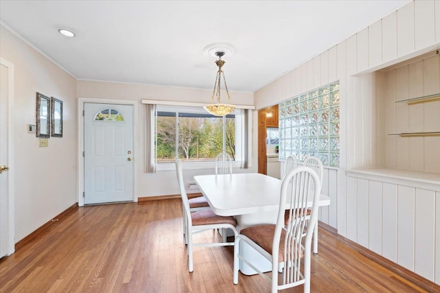 dining area with light hardwood / wood-style floors