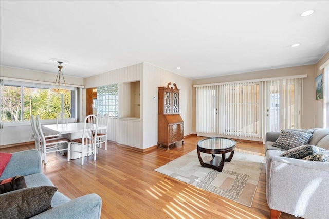 living room with light hardwood / wood-style flooring