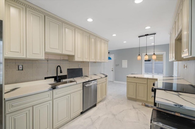 kitchen with sink, tasteful backsplash, decorative light fixtures, dishwasher, and cream cabinets