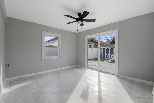 spare room with ceiling fan