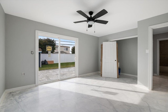 unfurnished room with ceiling fan