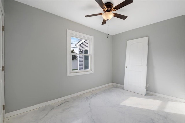 empty room featuring ceiling fan