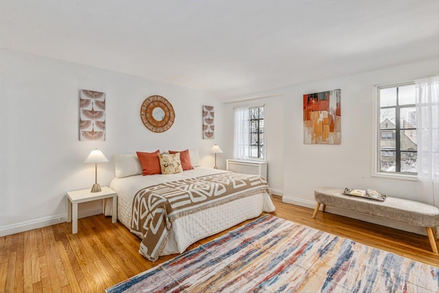 240-25 Alameda Ave, Douglaston, NY 11362 - bedroom featuring light wood-style flooring and baseboards