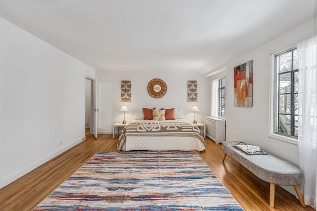 240-25 Alameda Ave, Douglaston, NY 11362 - bedroom featuring baseboards and wood finished floors