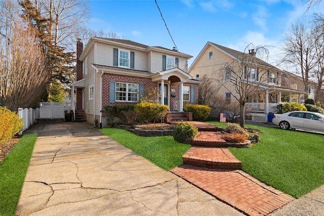 view of front property with a front lawn