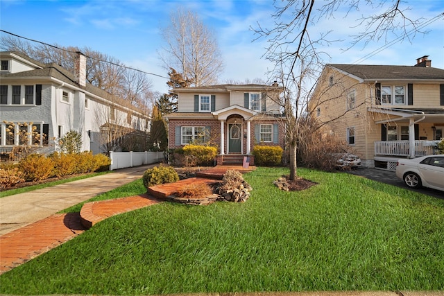 front of property featuring a front lawn