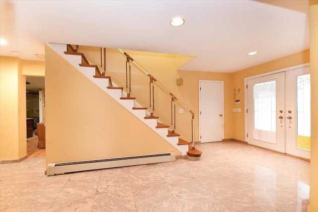foyer featuring a baseboard radiator, baseboards, stairs, and recessed lighting