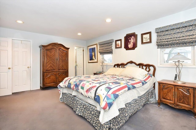 bedroom featuring carpet flooring, multiple windows, and recessed lighting